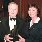 Dermot Gallagher, Director General, Dept. of Foreign Affairs, receives the Flax Trust Award on behalf of Dermot Ahern TD, Minister of Foreign Affairs